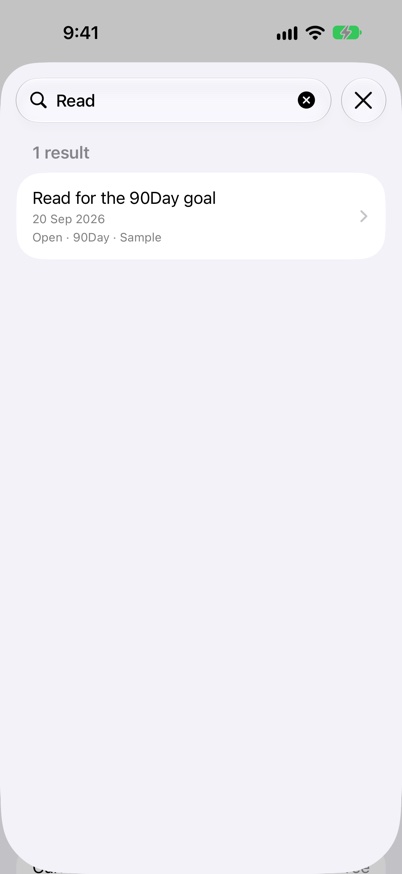 Search Tasks on iPhone showing results from sample planner content.